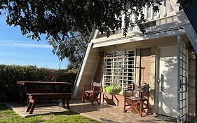 Nomená Caqué Casa de Playa